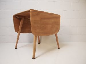 Blonde Ercol drop leaf dining table